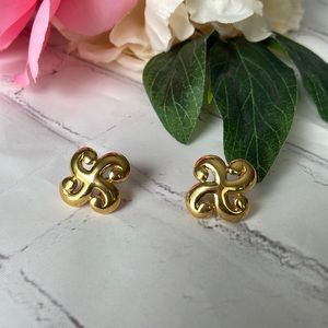 Trifari TM gold toned swirl earrings